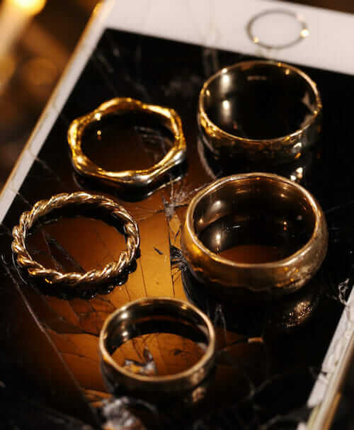 Gold rings placed on a mobile phone