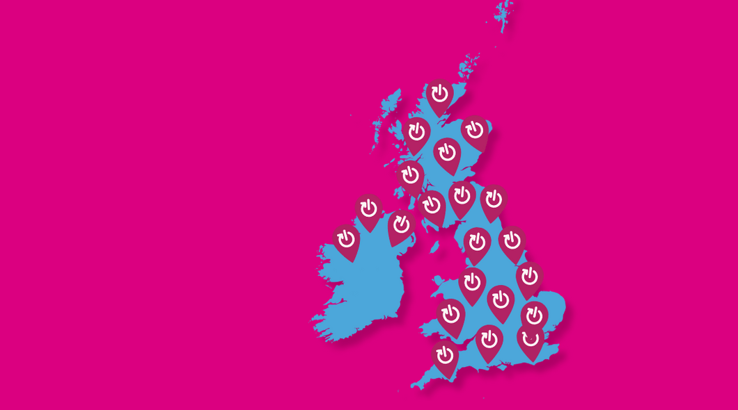 Graphic map of the uk in blue against a bright pink background, there are pink locator pin drops covering the UK map.