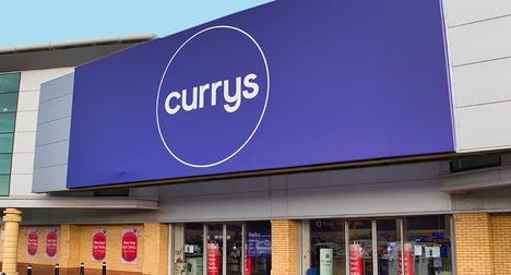 front view of a 'Currys' store with a blue background