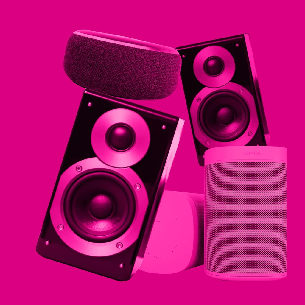 Floating speakers stacked in a pink haze against a bright pink backdrop