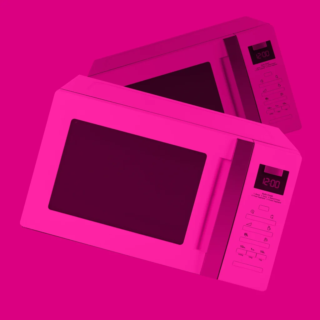 Floating microwaves in a pink haze against a bright pink backdrop